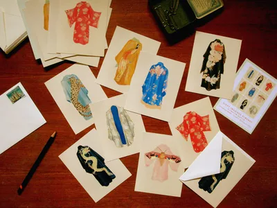 Kimono postcards spread out on a table