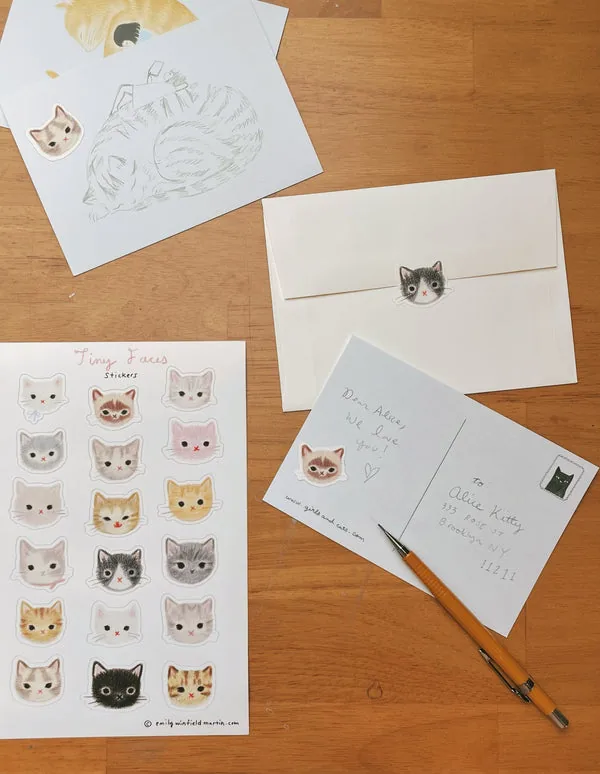 Tiny Faces stickers on envelopes